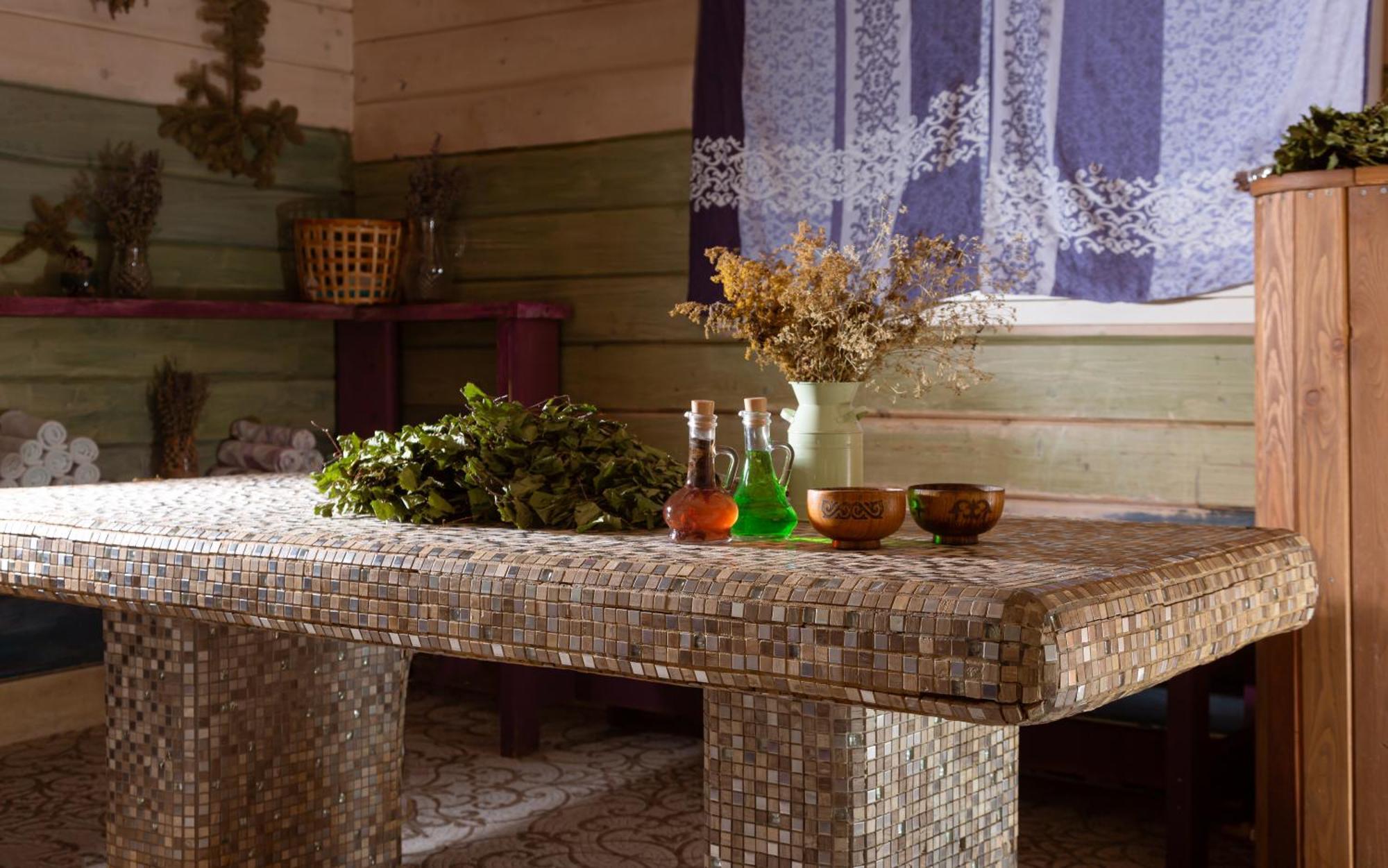 Rixos Borovoe Hotel Shchūchīnsk Buitenkant foto A stone table in a sauna
